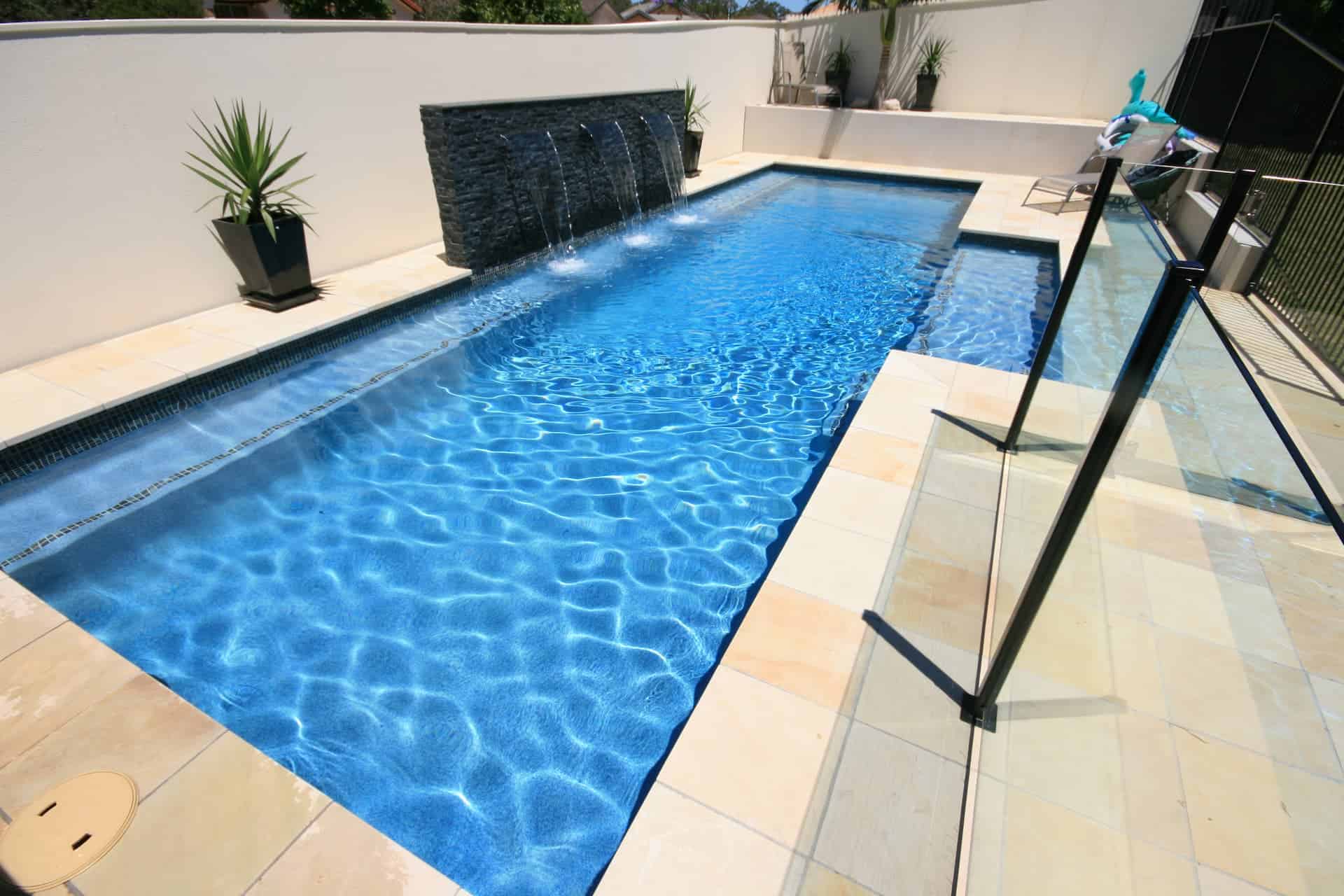 Photo of beautiful swimming pool using Blue Glass Pebble product